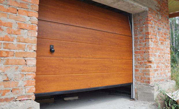 brown garage door left cracked open