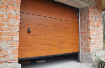 brown garage door left cracked open